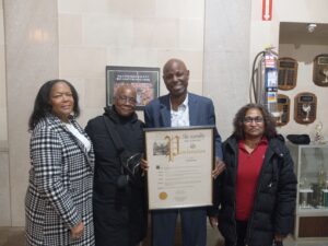 Alongside Transition Academy volunteers Beverly Slater, Patricia Smith and Devi Rouse, Dr. Waleek Boone was awarded a recent proclamation. 